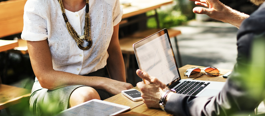 financial planner meets with client